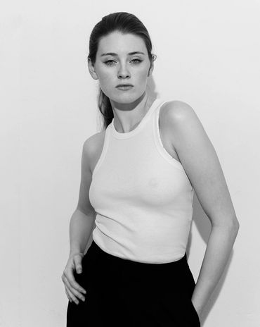 Model Meg, fashion shot in high key black & white.