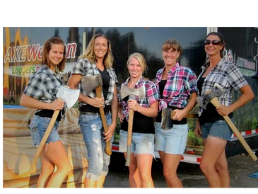 5 female professional timbersports athletes, lumberjills holding axes in front of Axe Women trailer