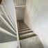 view of the stairs with a carpet on them