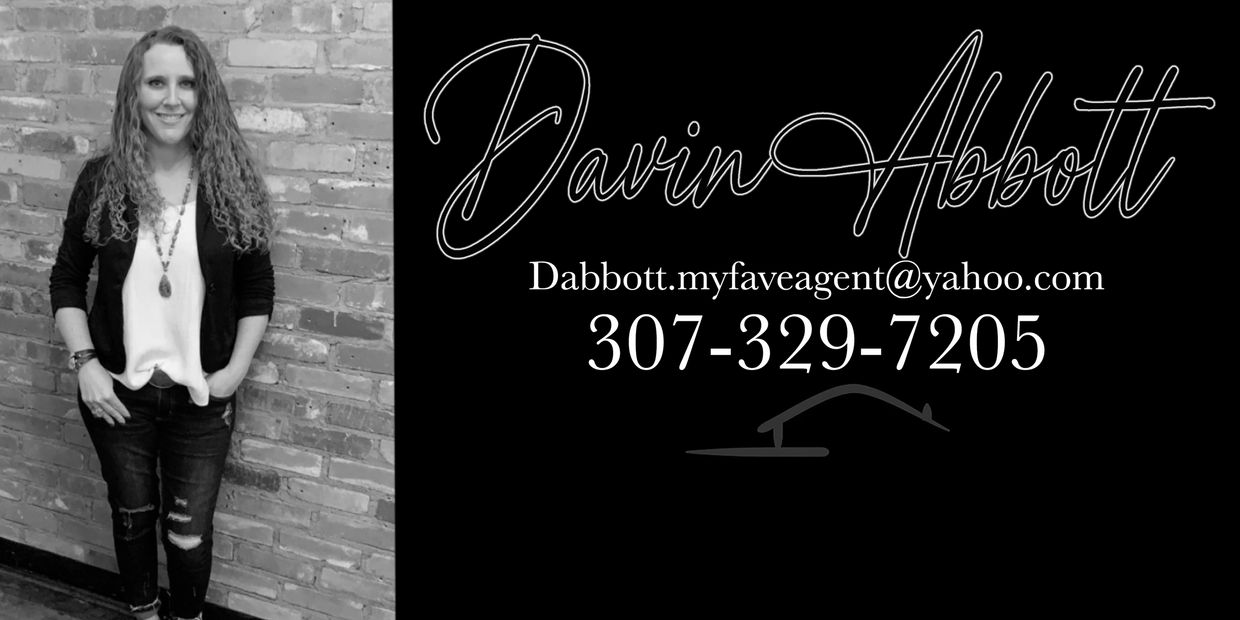 Davin Abbott standing against a brick wall with contact details on the right.