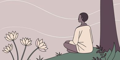 Person meditating under a tree near flowers.