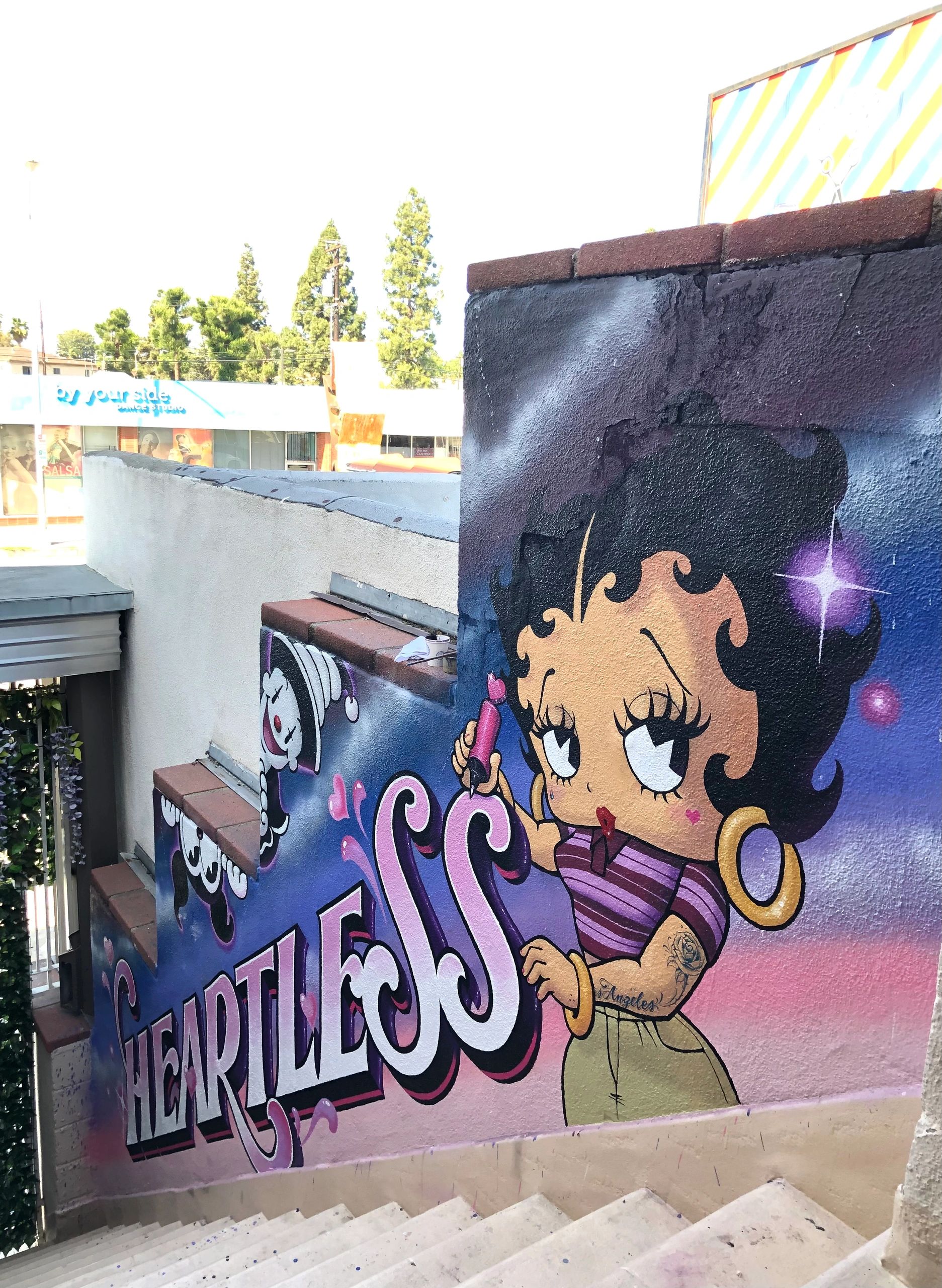 Exterior wall sign, wall mural, wall art for a tattoo shop