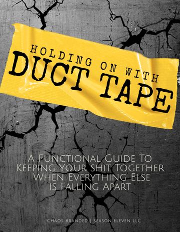 Yellow duct tape with text on cracked concrete background.