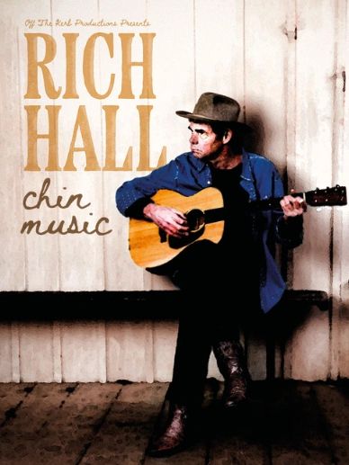 Rich Hall plays guitar on album cover.