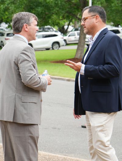 Jonathan McElvy talking with a client