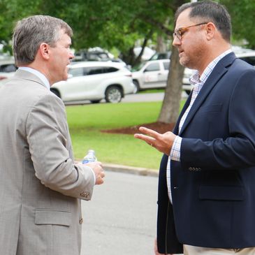 Jonathan McElvy talking to a client