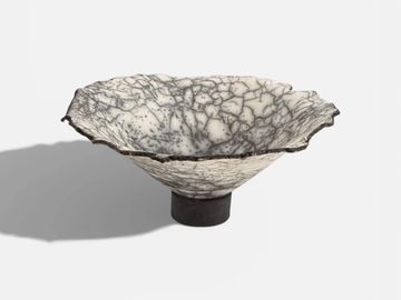 Crackled Footed 16"
Abstract 
Raku