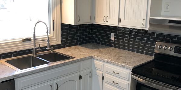 Kitchen Facelift!!!!! All new counters,sink, backsplash tiling, flooring.
Wall Color: Iron Ore