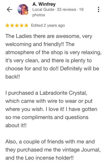 Positive review praising the shop's friendly atmosphere and unique products.