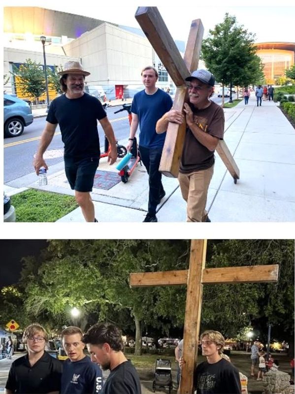 Evangelists carrying the cross on city streets.