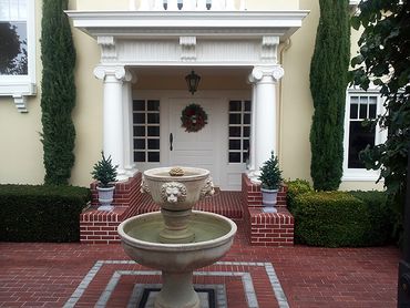masonry brick brickwork exterior facade mansion driveway mason bricks fountain house