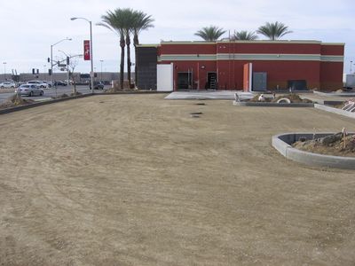 Sub grade work, base placement and finish grade work, prior to asphalt paving.