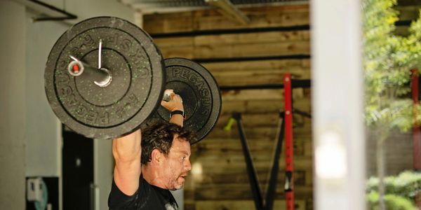 Snatching overhead, In a crossfit gym