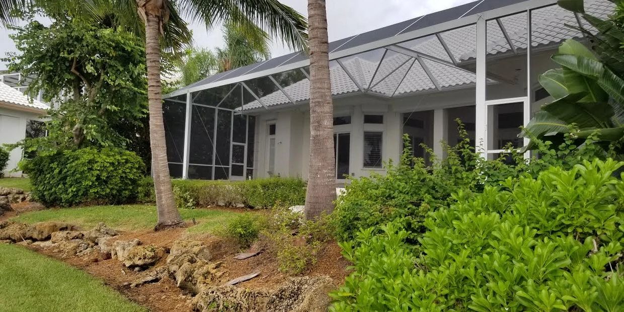 A home with one of our swimming pool enclosures in Naples, FL