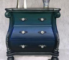 Custom painted Bombe chest in blue, green and silver.