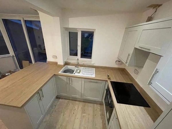 Wall removed to create a Kitchen-Diner. New kitchen and appliances installed.