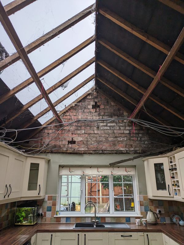 Kitchen ceiling suffered with leaks, customer wanted a vaulted ceiling with electric Velux