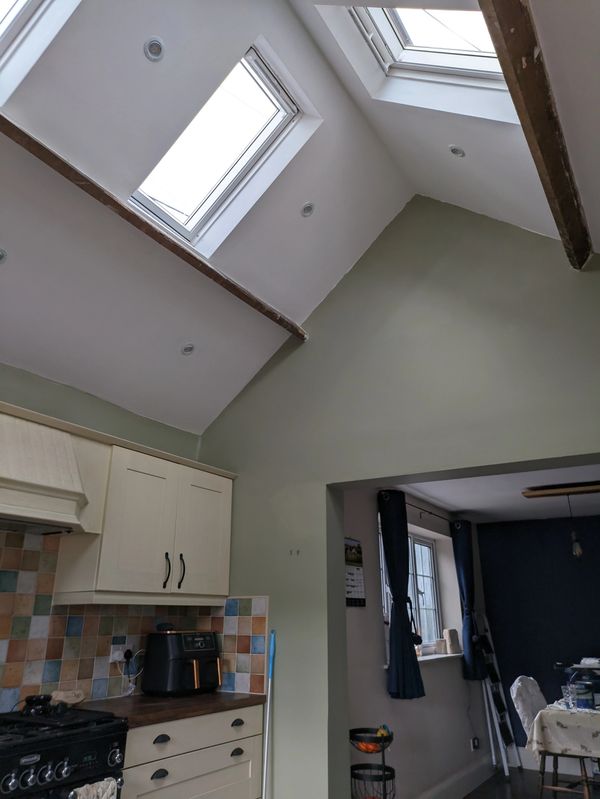 Kitchen ceiling suffered with leaks, customer wanted a vaulted ceiling with electric Velux