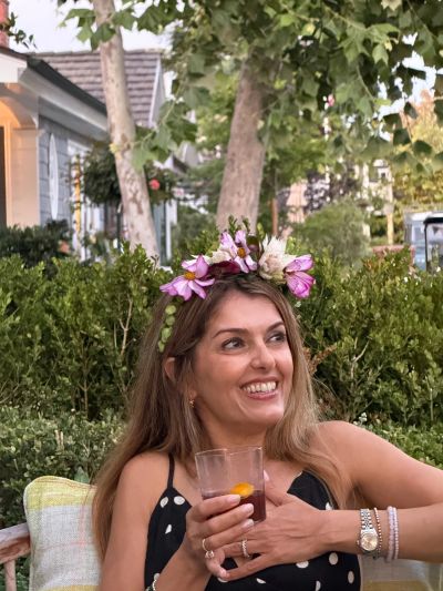 Close-up of woman wearing a flower crown.