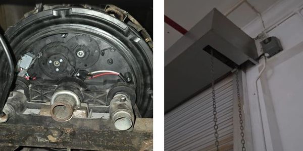 Close-up of mechanical gears and chains in an industrial setting.