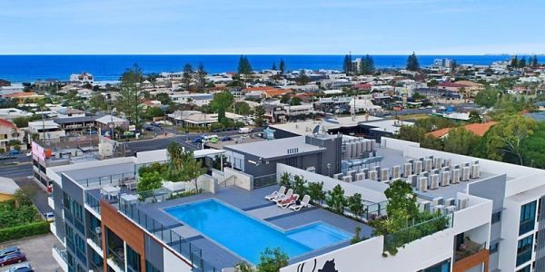 Rooftop pool with ocean view.