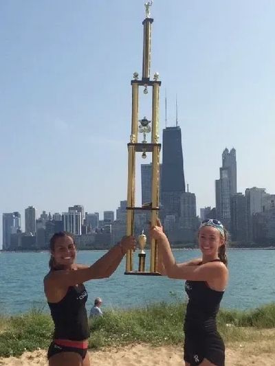 Abby (left) shows off trophy with teammate Alyssa