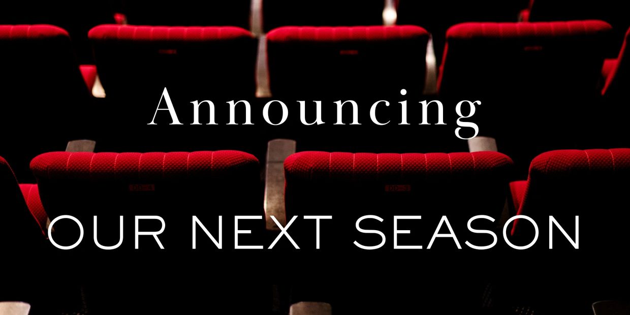 Announcing our next season with a backdrop of red theater seats.