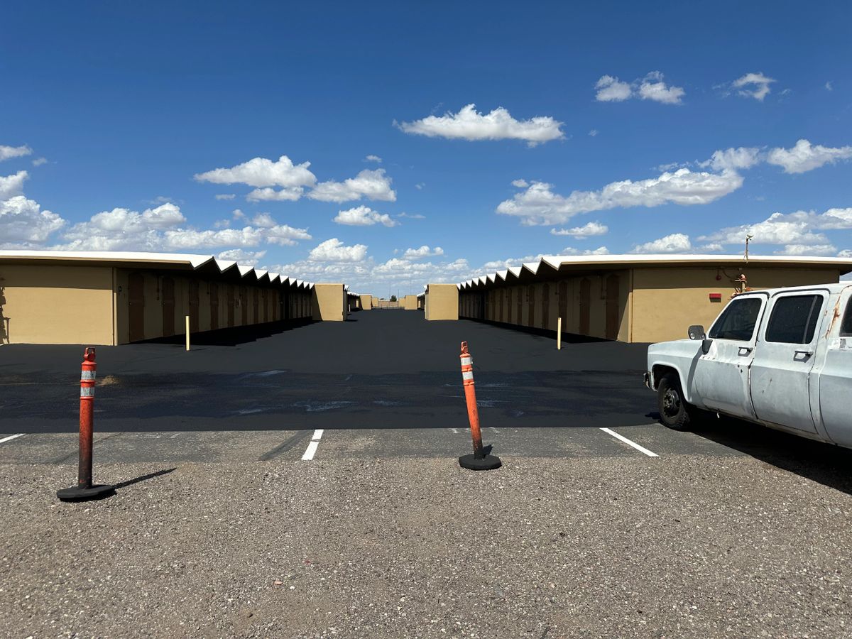 Close up of a freshly sealed asphalt finish