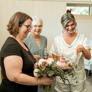 Three women standing together