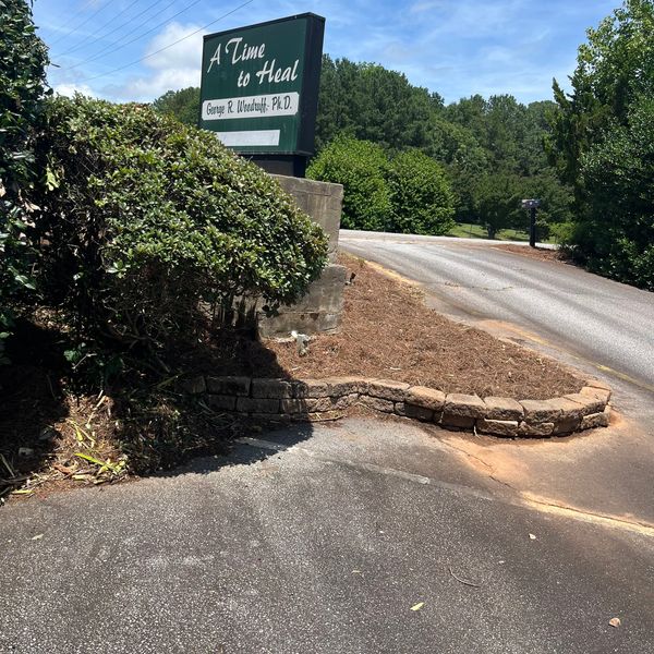 Entrance for A Time To Heal with the company sign visible