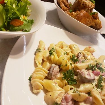 pasta with meat and salad