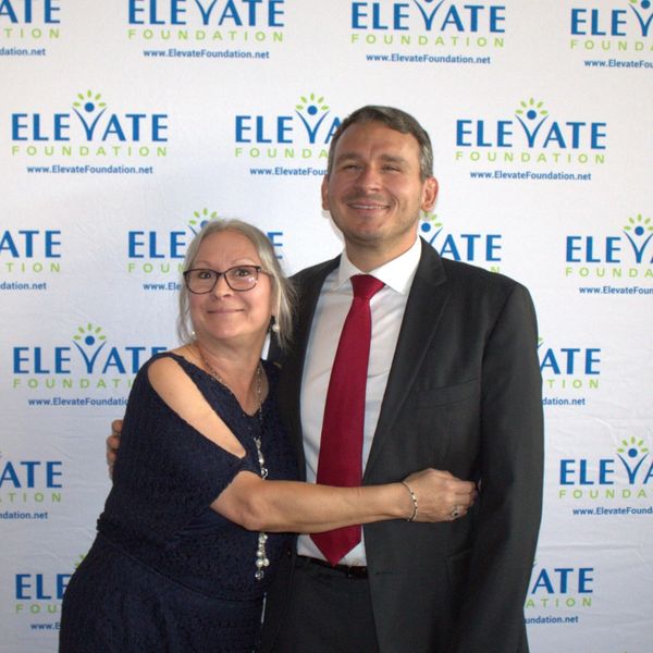 Bill with his mom, Chris, during a fundraiser for the Elevate Foundation.