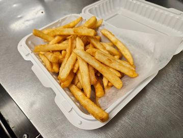 Hot and fresh crispy fries ready for delivery - Bison Pizza Winnipeg side orders and snacks.