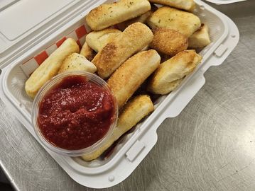 Hot breadsticks fresh from the pizza oven - Add to your Winnipeg pizza deals and order online.