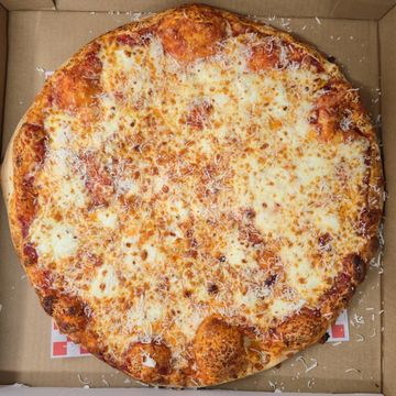 Four cheese pizza with mozzarella, Cheddar, feta, and pecorino Cheese, Bison Pizza Winnipeg West End