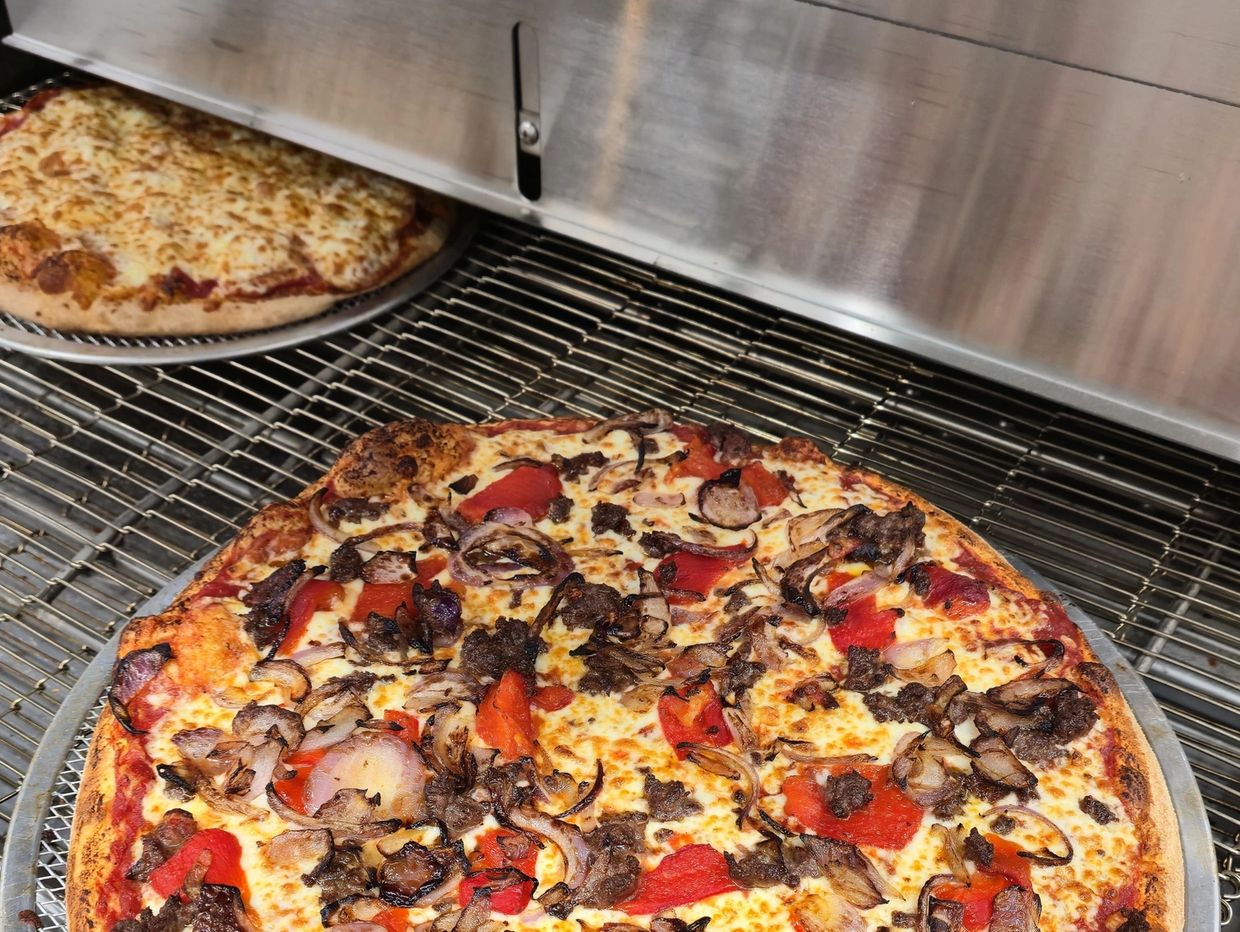 Lean Bison, Red Roasted Peppers and Caramalized Red Onion, give a perfect Bison Pizza for gameday