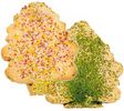 Two Christmas tree shaped cookies with colorful sprinkles.