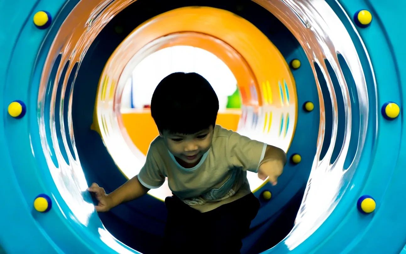 Indoor climbing structure and play equipment at Fidgets indoor playground in Las Vegas for kids' parties
