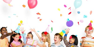 A picture of kids having fun and celebrating a birthday.