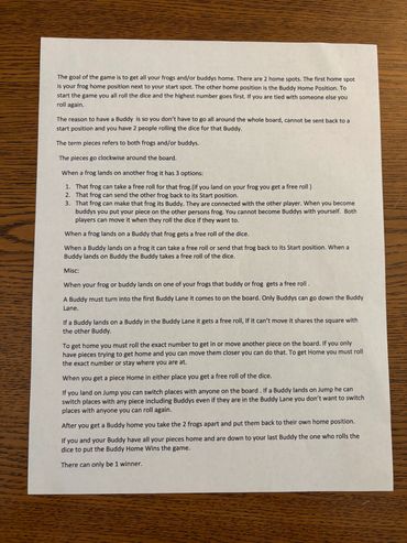 Game instructions for a frog-themed board game.