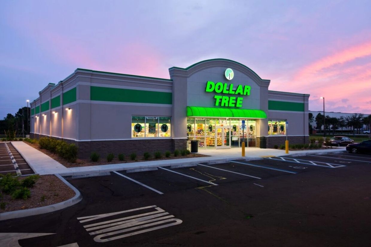 Dollar Tree store during sunset with a mostly empty parking lot.