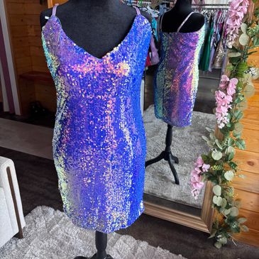 Blue and purple sequin dress on a mannequin.