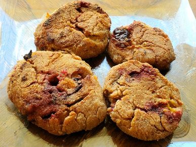 Plum fritters made with blue plums, wheat,  dandelion oil, water, raw honey, and fresh farm eggs!