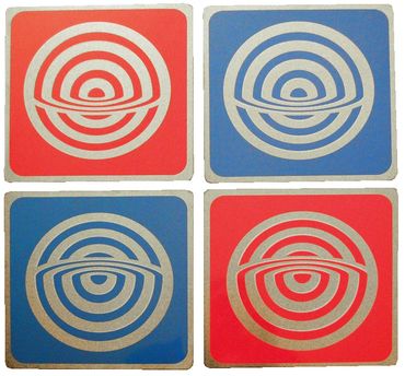 Four square coasters with concentric circle designs in red and blue backgrounds.