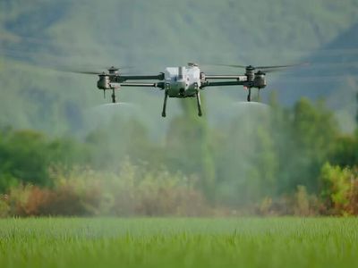 DJI Agras T40 conducting agricultural spraying