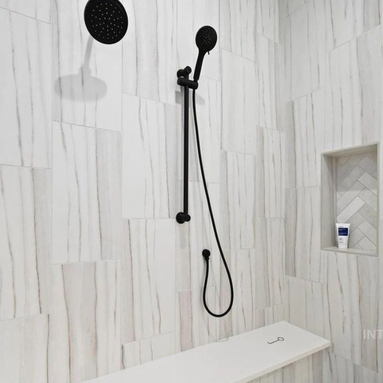 Finished walk-in shower with vertical tile