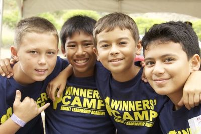 Winners Camp Camper Graduates Smiling