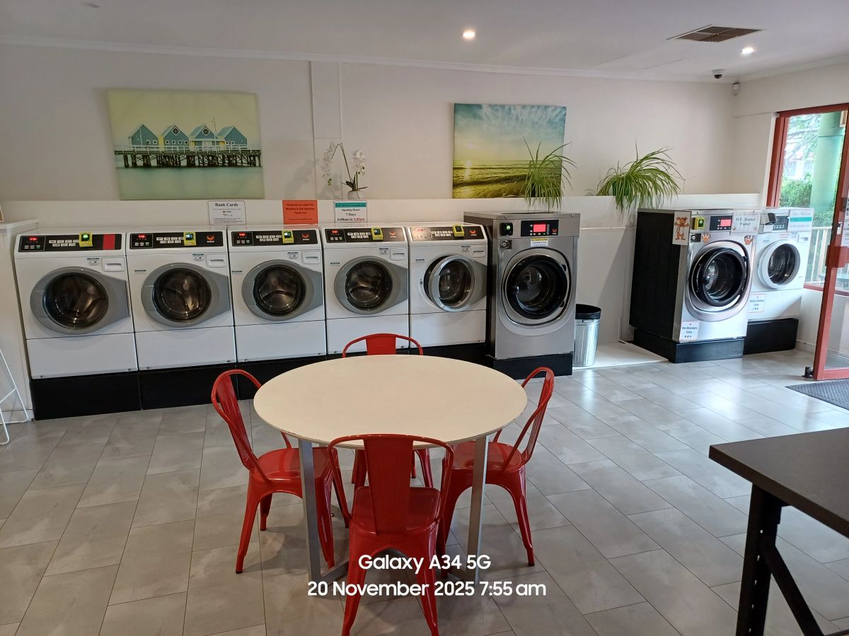 Inside Joondalup Laundrette — bright, modern space with seating