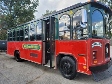 A Three Rivers Limousine Trolley going out on a trip.