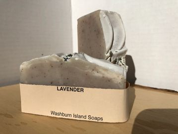 Lavender natural soap bar. The colour of the bar is brownish grey.